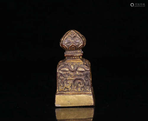 A COPPER GILT FLORAL SEAL