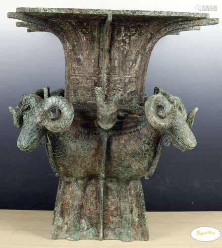 An Archaic Bronze Ritual Wine Vessel