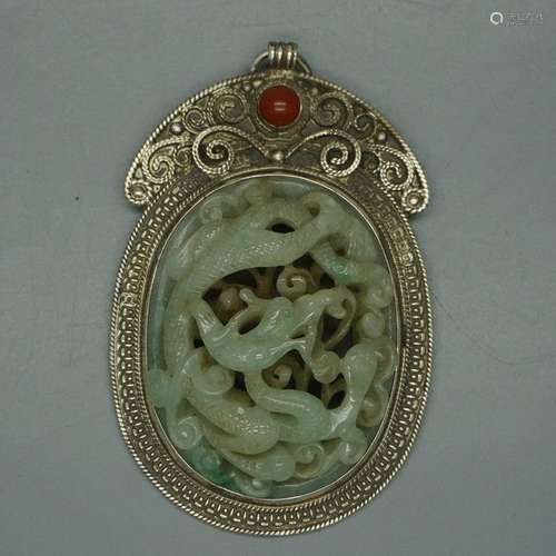 A Carved Jade Pendant