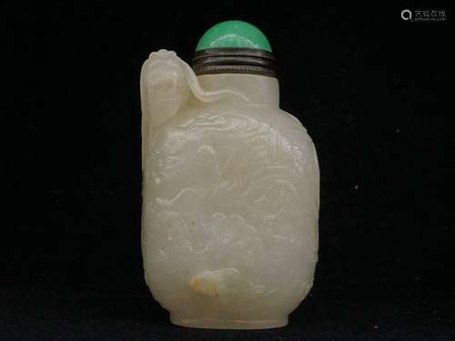 A Carved White Jade Snuff Bottle