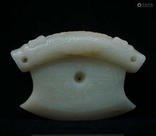 A Carved White Jade Ornament