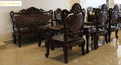 A Set of Eight Pieces of Hand Carved Rosewood