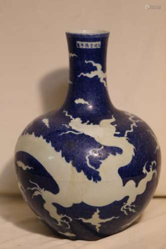 A Reverse Blue Ground and White Dragon Vase