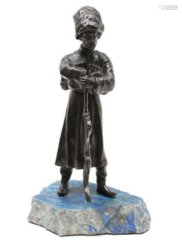 AN IMPERIAL RUSSIAN BRONZE OF COSSACK, 20TH CEN.