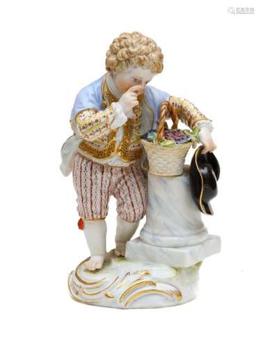 MEISSEN PORCELAIN FIGURINE OF A BOY WITH BASKET