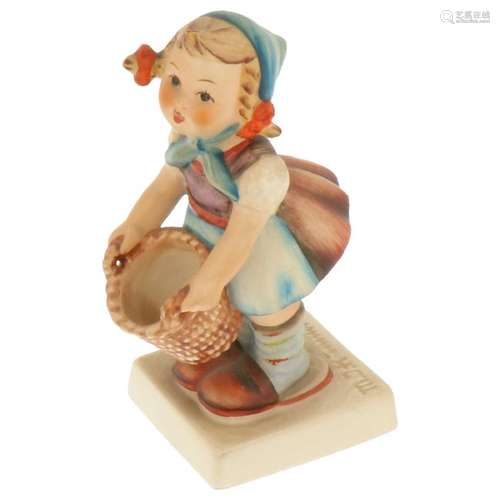 Hummel figurine with a basket.