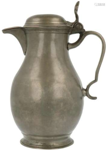 Pewter flap jug Thumb rest in the shape of a shell.