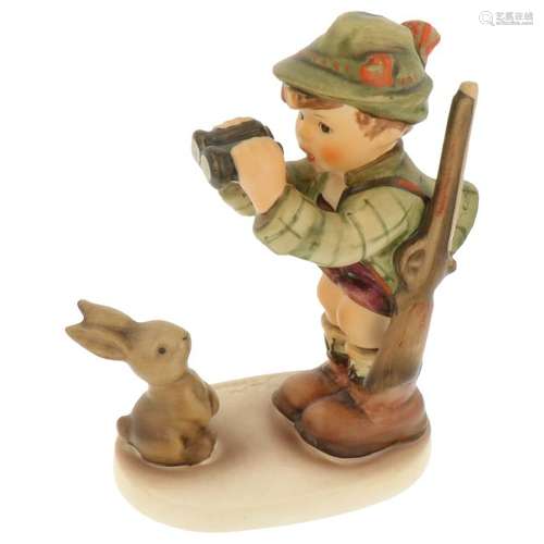 Hummel figurine as a hunter with a rabbit.