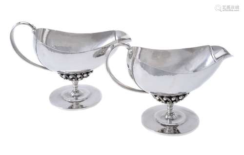 Georg Jensen, a pair of Danish silver cream boats