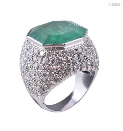 An emerald and diamond dress ring