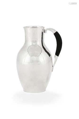 ϒ Georg Jensen, a Danish silver water jug or pitcher