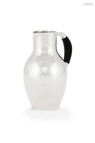 ϒ Georg Jensen, a Danish silver water jug or pitcher