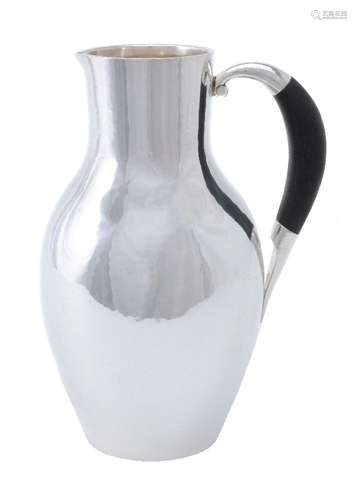 ϒ Georg Jensen, a Danish silver water jug or pitcher