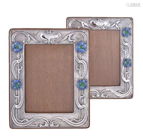 A matched pair of Art Nouveau silver photograph frames by William Neale