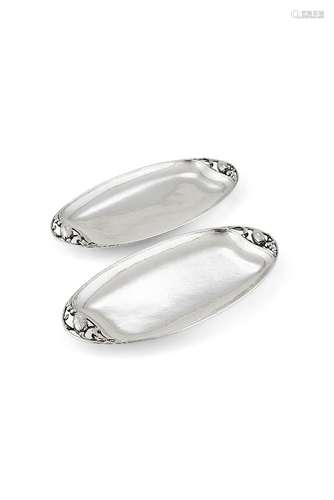 Georg Jensen, a pair of Danish silver Blossom pattern trays