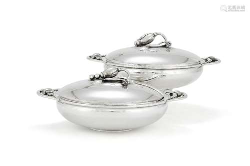 Georg Jensen, a pair of Danish silver Blossom pattern circular vegetable dishes