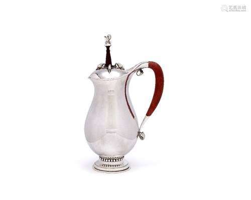 ϒ Georg Jensen, a Danish silver baluster chocolate pot or pitcher