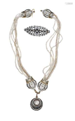 A diamond brooch and pearl necklace by Carlo Giuliano