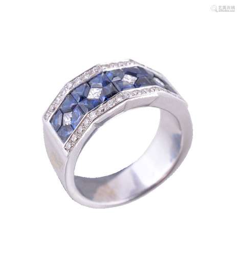 A diamond and sapphire ring