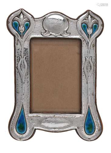 An Arts and Crafts silver and enamel photograph frame by Deakin & Francis