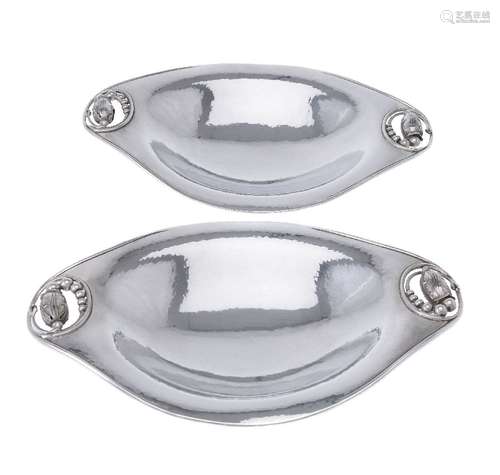 Georg Jensen, a pair of Danish silver Blossom pattern long oval dishes