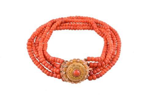 A multi strand coral bead necklace