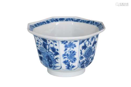 An octagonal blue and white porcelain Kakiemon style 'klapmuts' bowl, decorated with flowers. Marked