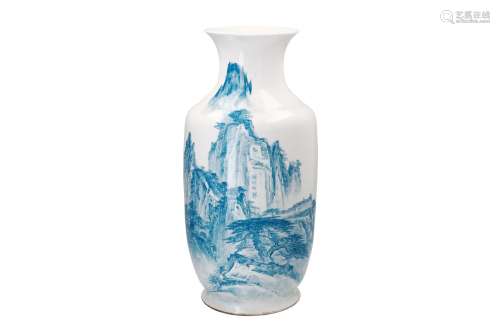 A blue and white porcelain vase, decorated with a mountainous landscape and characters. Marked