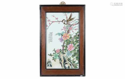 A polychrome porcelain plaque in wooden frame, depicting birds, flowers and poems. Made in 1986.