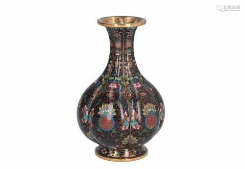 A hexagonal polychrome enamel cloisonné vase with ribbed belly, decorated with flowers, shou signs