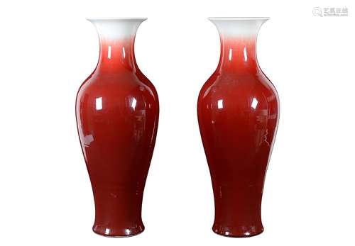 A pair of sang de boeuf glazed porcelain vases. Unmarked. China, 20th century. H. 84 cm. Provenance: