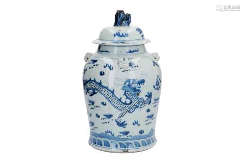 A blue and white porcelain lidded jar, decorated with dragons chasing the burning pearl. Unmarked.