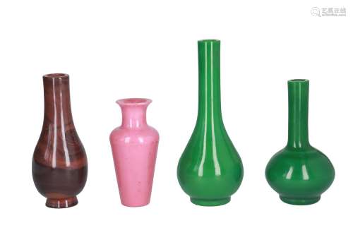 Lot of four Peking glass vases, two apple green, one brown and one pink. All unmarked. China, 20th