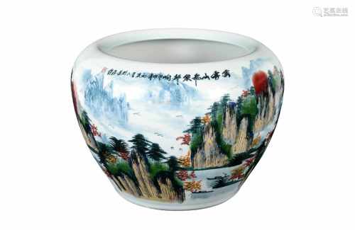 A polychrome porcelain flower pot, decorated with a mountainous river landscape and characters.