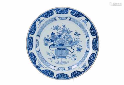 A blue and white porcelain charger, decorated with flowers and ruyi. Unmarked. China, Qianlong.