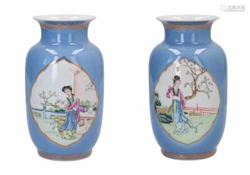 A lot of two clair de lune porcelain vases, decorated with reserves depicting long Elizas in a
