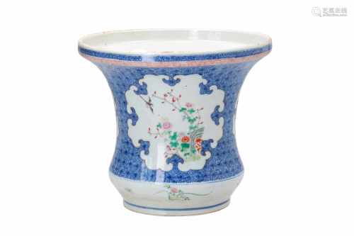 A polychrome porcelain cachepot, decorated with birds and flowers in three reserves. Unmarked.
