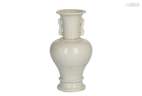 A blanc de Chine stoneware baluster vase with two handles. Unmarked. China, Dehua, ca. 1600. H. 16