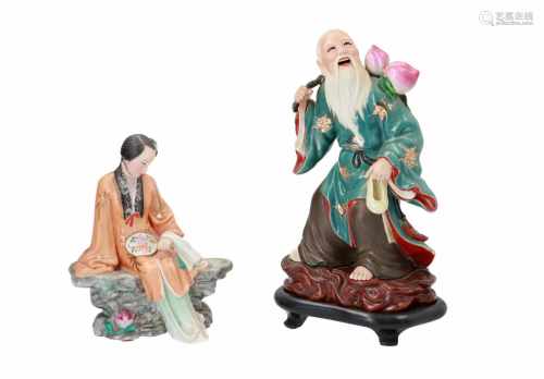 Lot of two polychrome porcelain sculptures, depicting 1) a man with peaches, on wooden base.