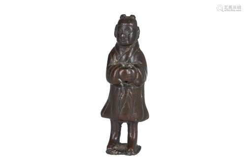 A bronze sculpture of a standing figure. China, Ming. Weight ca. 115 g. H. 9 cm.