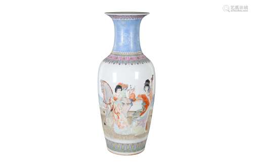 A large polychrome porcelain vase, decorated with a lady playing the lute and a lady with a horse.