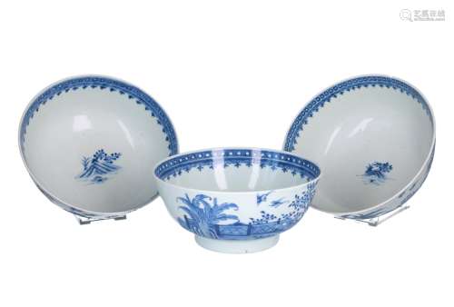 A set of three blue and white porcelain bowls, decorated with birds in a garden. Unmarked. China,