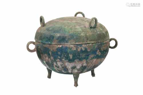 A bronze Ding or Dui, decorated with stamped waffle pattern. The body with two handles, the lid with