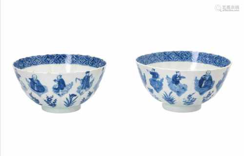 A pair of blue and white porcelain bowls, decorated with the immortals. The rim with geometric decor