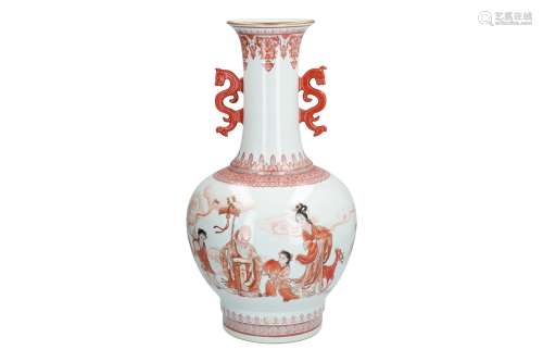 An iron red porcelain vase, decorated with dignitary, figures and a poem. The handles in the shape