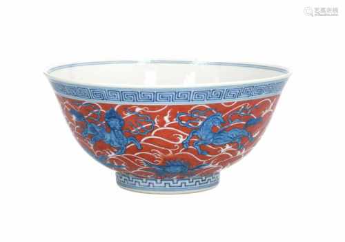 A polychrome porcelain bowl, decorated with mythical creatures. Marked with seal mark Qianlong.