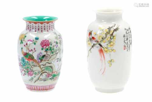 Lot of two polychrome porcelain vases, decorated with birds and flowers. One marked with seal