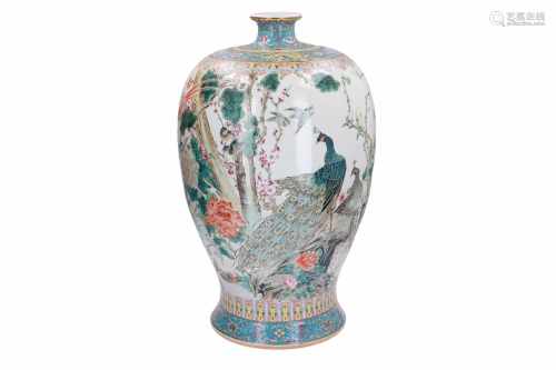 A large polychrome porcelain Meiping vase, decorated with peacocks, birds and flowers. The base with
