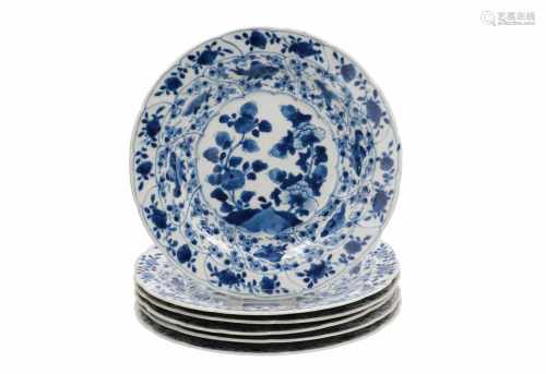 A set of six blue and white porcelain dishes, decorated with fruits. The rim with fish, shrimps