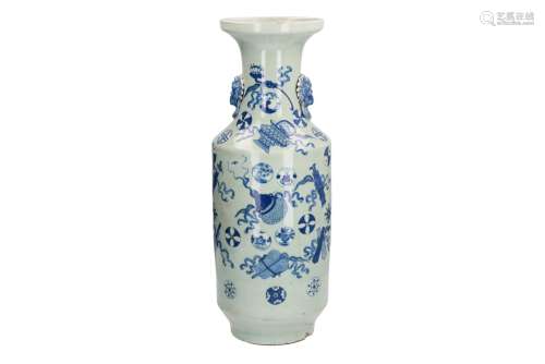 A blue and white porcelain vase, decorated with antiquities. The handles in the shape of lion heads,